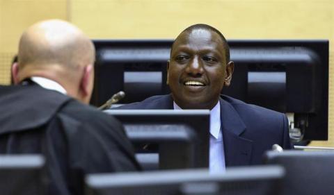 William Ruto (R) sits in the courtroom of the International Criminal Court (ICC) in The Hague