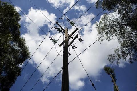 A utility pole supporting wires for electricity distribution is seen in Nairobi, Kenya, November 11, 2015. PHOTO BY REUTERS/Siegfried Modola