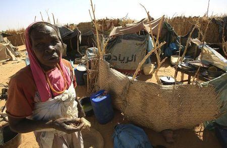 A woman looks on beside a shelter after arriving at the Zam Zam IDP camp, near Al Fashir in North Darfur, April 9, 2015. PHOTO BY REUTERS/Mohamed Nureldin Abdallah