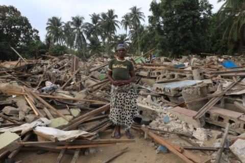 A woman poses for a picture at the site of demolition of the Okun Glass community in Lagos, Nigeria, January 16, 2020. PHOTO BY REUTERS/Temilade Adelaja