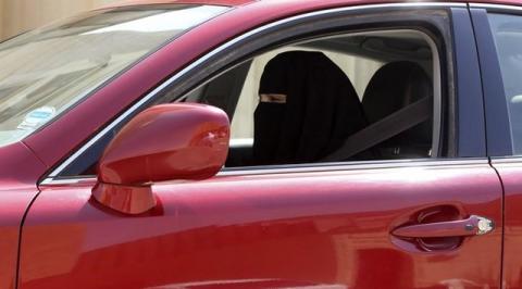 A woman drives a car in Saudi Arabia, October 22, 2013. PHOTO BY REUTERS/Faisal Al Nasser