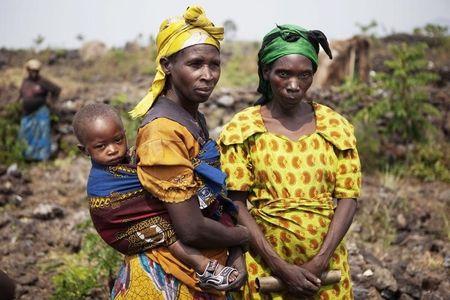 Members of a pygmy community gather for a village census at Mugunga, just west of the eastern Congolese city of Goma, August 24, 2010. PHOTO BY REUTERS/Finbarr O'Reilly