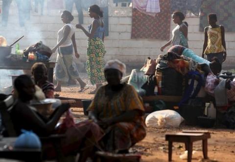 Women are pictured in a camp for internally displaced people on the grounds of the Saint Sauveur church in the capital Bangui, Central African Republic, November 25, 2015. PHOTO BY REUTERS/Siegfried Modola