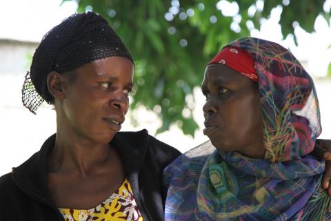 Constancia Uwimana, 39, and Immaculee Mukantabana, 57, outside the charity ActionAid office in southern Rwanda's Nyanza district on April 8, 2019. PHOTO BY THOMSON REUTERS FOUNDATION/Nita Bhalla