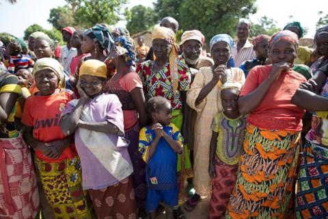 Women stand in line for food aid distribution delivered by the United Nations Office for the Coordination of Humanitarian Affairs and world food program in the village of Makunzi Wali, Central African Republic, April 27, 2017. PHOTO BY REUTERS/Baz Ratner