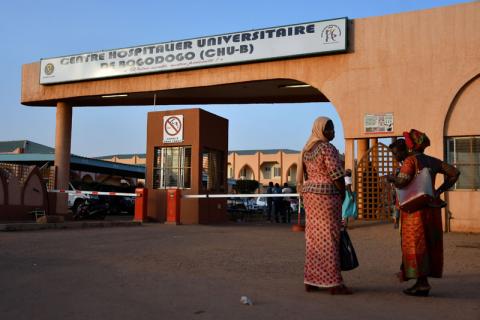 Women stand outside Bogodogo hospital where officials met with family members of victims of an ambush on workers near a Canadian-owned mine, in Ouagadougou, Burkina Faso, November 7, 2019. PHOTO BY REUTERS/Anne Mimault