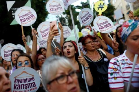 Women rights activists shout slogans during a protest against what they say are violence and animosity they face from men demanding they dress more conservatively, in Istanbul, Turkey, July 29, 2017. PHOTO BY REUTERS/Murad Sezer