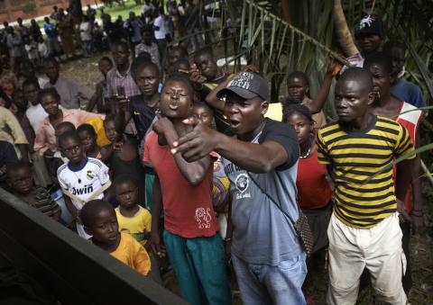 People protest during a religious reconciliation tour in the outskirts of Bangui