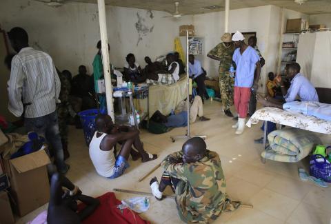 Wounded South Sudan military personnel receive medical treatment at the general military hospital in the capital Juba