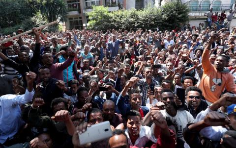 Oromo youth shout slogans outside Jawar Mohammed's house, an Oromo activist and leader of the Oromo protest in Addis Ababa, Ethiopia, October 23, 2019. PHOTO BY REUTERS/Tiksa Negeri