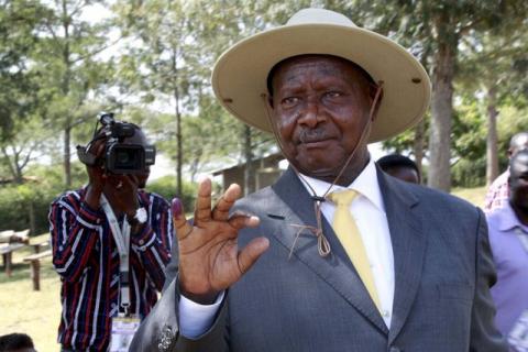 Uganda's incumbent President Yoweri Museveni displays his inked finger after casting his vote at a polling station during the presidential elections in Kirihura in western Uganda, February 18, 2016. PHOTO BY REUTERS/James Akena