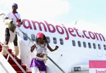 Traditional Dancers perform on JamboJet's Boeing 737 during the official launch of the low cost airliner at the Jomo Kenyatta International Airport (JKIA) in Kenya's capital Nairobi. PHOTO BY REUTERS/Noor Khamis