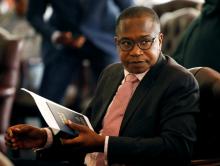 Zimbabwean Finance Minister Mthuli Ncube looks on before the swearing in of new cabinet ministers at State House in Harare, Zimbabwe, September 10, 2018. PHOT BY REUTERS/Philimon Bulawayo