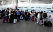 Passengers are seen at check-in points at Enfidha-Hammamet International Airport, Tunisia, September 23, 2019. PHOTO BY REUTERS/Zoubeir Souissi