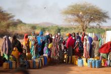 Somali women wait to collect water at the New Kabasa internally displaced camp in the northern Somali town of Dollow, Somalia, February 25, 2018. PHOTO BY REUTERS/Baz Ratner