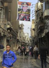 A poster of Army Chief General Abdel Fattah al-Sisi hangs near souvenir shops