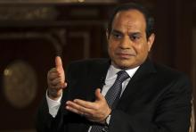 Egypt's presidential candidate and former army chief Abdel Fattah al-Sisi gestures during an interview with Reuters in Cairo