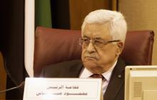 Palestinian President Mahmoud Abbas attends the Arab League Foreign Ministers emergency meeting at the League's headquarters in Cairo