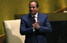 Egypt's President Abdel Fattah al-Sisi acknowledges applause as he takes the stage before his address to the 69th United Nations General Assembly at U.N. headquarters in New York