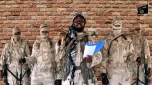 Leader of one of the Boko Haram group's factions, Abubakar Shekau speaks in front of guards in an unknown location in Nigeria in this still image taken from an undated video obtained on January 15, 2018. PHOTO BY REUTERS/Boko Haram Handout/Sahara Reporters