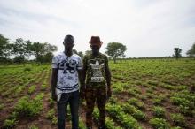 Local activists and would-be migrants Moussa Kebe (L) and Ousmane Thiam (R) pose for a photo on a farm in Goudiry, Senegal, September 5, 2016. PHOTO BY REUTERS/Mikal McAllister