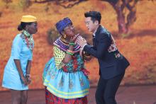 Chinese actor Lou Naiming (C) performs a skit on a Lunar New Year gala in Beijing, China, February 15, 2018. PHOTO BY REUTERS/Stringer