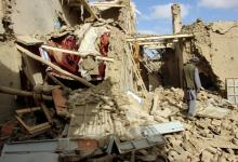 An Afghan man inspects a house destroyed during an air strike called in to protect Afghan and U.S. forces during a raid on suspected Taliban militants, in Kunduz, November 2016. PHOTO BY REUTERS/Nasir Wakif