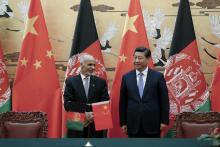 Chinese President Xi Jinping (R) with Afghan President Ashraf Ghani Ahmadzai attend a signing ceremony at the Great Hall of the People in Beijing, October 28, 2014. PHOTO BY REUTERS/Lintao Zhang