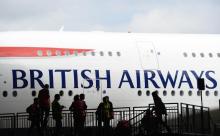 British Airways' new Airbus A380 arrives at a hanger after landing at Heathrow airport in London