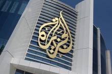 The logo of Al Jazeera Media Network is seen on its headquarters building in Doha, Qatar, June 8, 2017. PHOTO BY REUTERS/Naseem Zeitoon