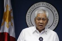 Philippine Foreign Secretary Albert del Rosario delivers a statement during a news conference in Manila