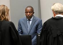 War crimes suspect Alfred Yekatom, wanted for alleged murder, deportation and torture of Muslims in the Central African Republic, appears before the International Criminal Court in The Hague, Netherlands, November 23, 2018. PHOTO BY REUTERS/Piroschka van de Wouw