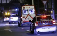 An ambulance (2R) carrying Cuban doctor Felix Baez leaves Cointrin airport in Geneva, November 21, 2014. PHOTO BY REUTERS/Denis Balibouse