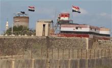 An Egyptian soldier stands guard on the border between Egypt and southern Gaza Strip 