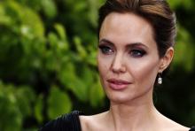 Actress Angelina Jolie arrives for a special Maleficent Costume Display at Kensington Palace in London