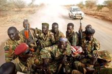 South Sudan's army, or the SPLA, soldiers drive in a truck on the frontline in Panakuach, Unity state, April 24, 2012. PHOTO BY REUTERS/Goran Tomasevic