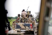 A Nigerian army convoy vehicle drives ahead with an anti-aircraft gun, on its way to Bama, Borno State, Nigeria, August 31, 2016. PHOTO BY REUTERS/Afolabi Sotunde