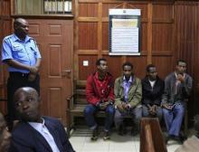 Somali men Mohamed Ahmed Abdi (seated L-R), Liban Abdullah Omar, Adan Mohamed Ibrahim and Hussein Hassan appear at the High Court for bail application in capital Nairobi