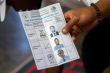 A polling staff member counts ballots at a polling centre in Kigali, Rwanda, August 4, 2017. PHOTO BY REUTERS/Jean Bizimana