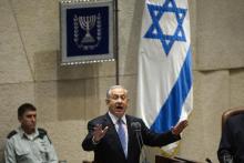 Israel's Prime Minister Benjamin Netanyahu speaks at the opening of the winter session of the Knesset, the Israeli parliament, in Jerusalem, October 27, 2014. PHOTO BY REUTERS/Ronen Zvulun