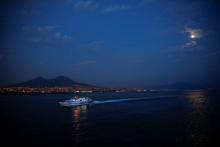 A ferry boat sails in the port of Naples, Italy July 25, 2018. PHOTO BY REUTERS/Tony Gentile