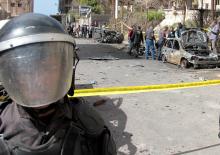 A security personnel stands guard, during the forensics team investigation of a bombing in Alexandria, Egypt, March 24, 2018. PHOTO BY REUTERS/Fawzy Abdel Hamied
