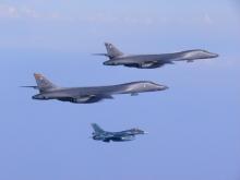 Two U.S. Air Force B-1B Lancer bombers fly a 10-hour mission from Andersen Air Force Base, Guam, escorted by a Japan Air Self-Defense Force F-2 fighter jet into Japanese airspace and then over the Korean Peninsula, July 30, 2017. PHOTO BY REUTERS/U.S. Air Force