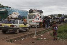 Cars line up to enter Guinea from Mali at the border in Kouremale