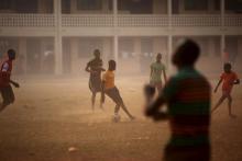 Boys play soccer on a field of a school used as an electoral centre at the end of the presidential and legislative elections, in the mostly muslim PK5 neighbourhood of Bangui, Central African Republic, February 14, 2016. PHOTO BY REUTERS/Siegfried Modola