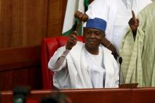 Bukola Saraki raises the gavel after he was elected as the senate president of the 8th Nigeria Assembly in Abuja, Nigeria, June 9, 2015. PHOTO BY REUTERS/Afolabi Sotunde