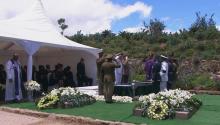 Military personnel salute after the burial of former South African President Nelson Mandela in his ancestral village of Qunu in the Eastern Cape province, 900 km (559 miles) south of Johannesburg