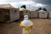 A health worker wearing Ebola protection gear, walks before entering the Biosecure Emergency Care Unit (CUBE) at the ALIMA (The Alliance for International Medical Action) Ebola treatment centre in Beni, in the Democratic Republic of Congo, March 30, 2019. PHOTO BY REUTERS/Baz Ratner