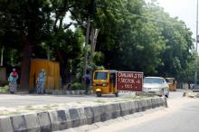 A car drives towards a Civilian Joint Task Force (CJTF) sector 5 sign in Maiduguri, Nigeria, August 30, 2016. PHOTO BY REUTERS/Afolabi Sotunde