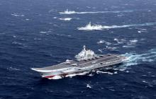 China's Liaoning aircraft carrier with accompanying fleet conducts a drill in an area of South China Sea, in this undated photo taken December, 2016. PHOTO BY REUTERS/Stringer